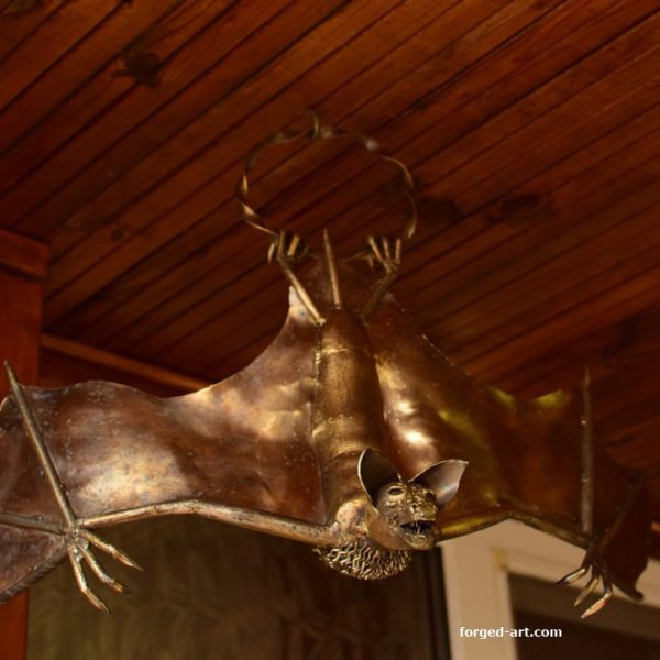 Bat - forged sculpture made of stainless steel